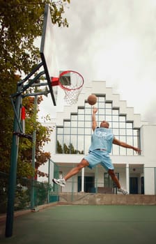 Man plays basketball