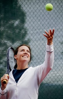 A woman playing tennis