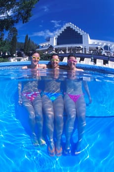 Portrait of three women in swimming pool