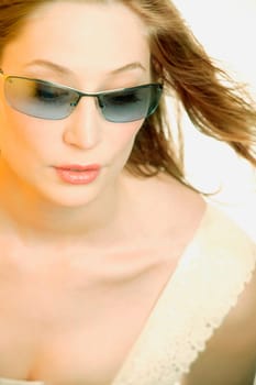 Woman with blue sunglasses