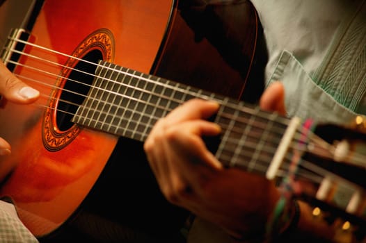 Closeup of a guitar being played