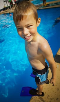 A child ready to go swimming