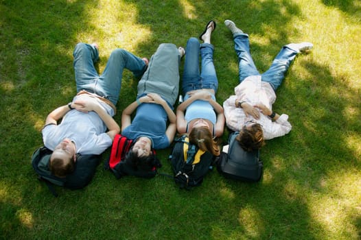 A group of young people napping