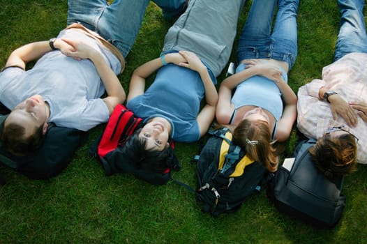 A group of young people napping