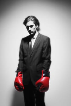 Businessman with boxing gloves