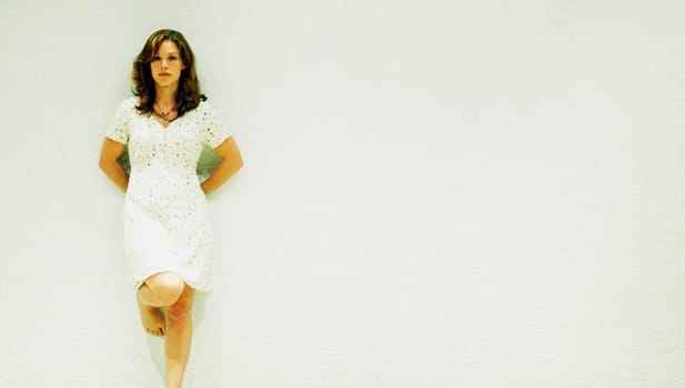 Portrait of a woman in a white dress