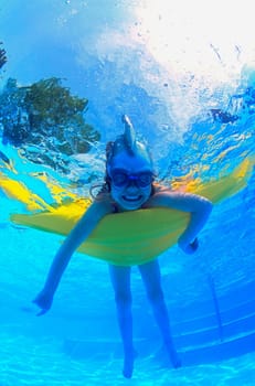 Child in swimming pool