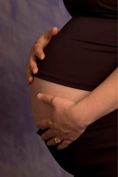 Pregnant mother feeling tummy