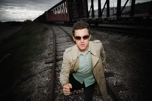 Man runs alongside a train