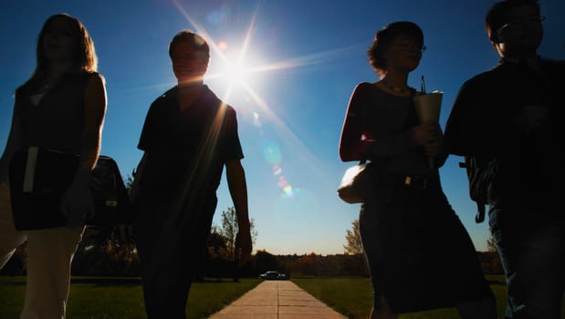 Silhouette group walking