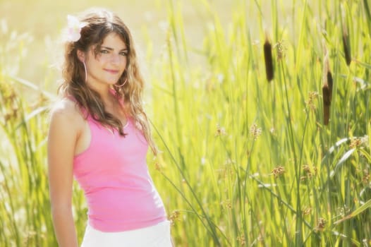 Girl posing in reeds