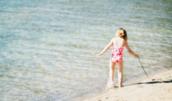 Girl playing in water
