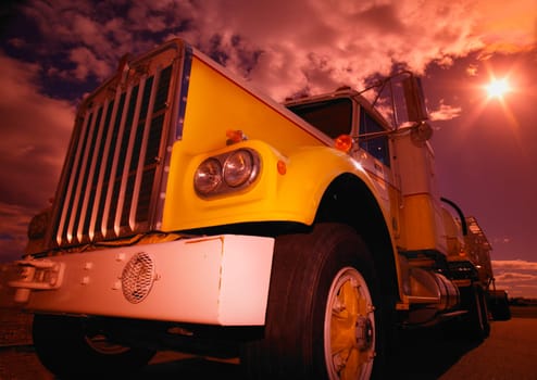 Closeup of a yellow semi
