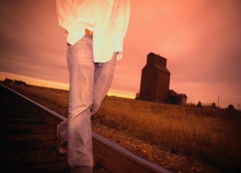Man walking on train track