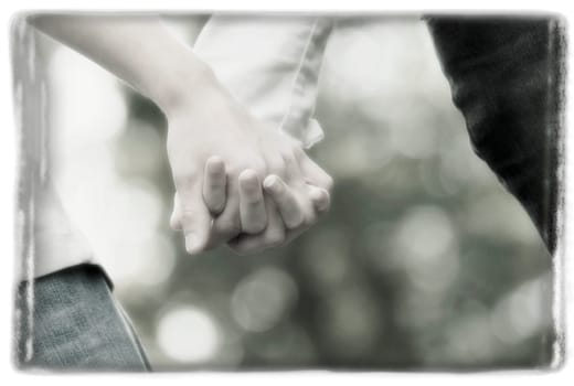 Couple holding hands