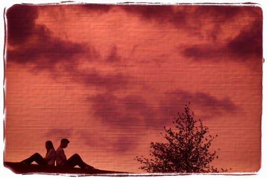 Couple sitting back to back