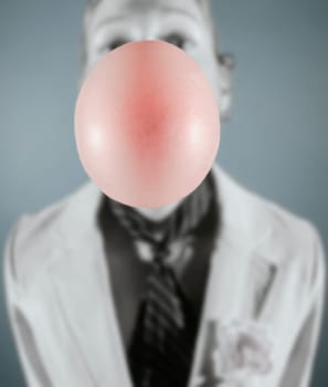 Blowing a bubble in a suit