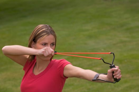 Woman with slingshot