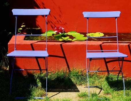 The purple folding chair in the garden