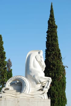 Statue of horses in a park