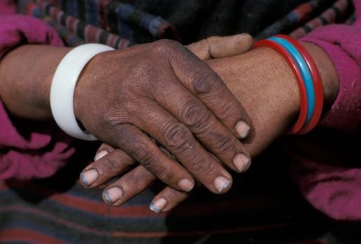 Ethnic hands folded