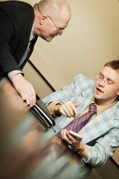 Two businessmen having a discussion