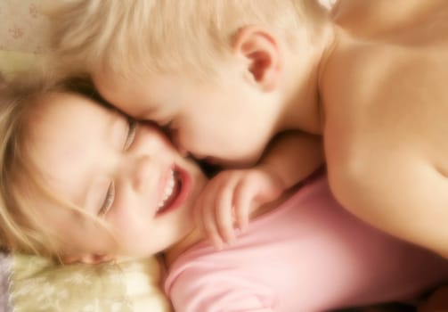 Two children hugging