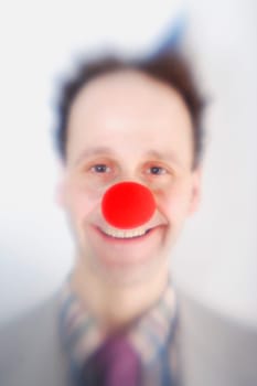 Man wearing clown's nose
