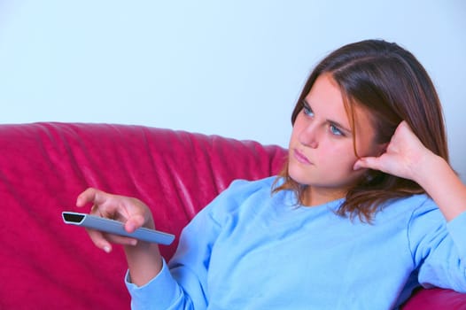 Teen with TV remote