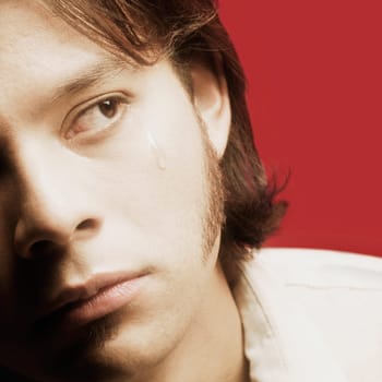 A young man's teardrop