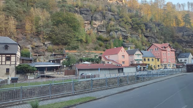 Colourful hillside village hotel apartment nature travel tourism summer day park autumn road Hrensko Czech Republic Europe . High quality photo