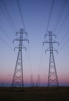 Rows of electricity pylons