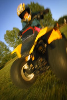 Child on a quad bike