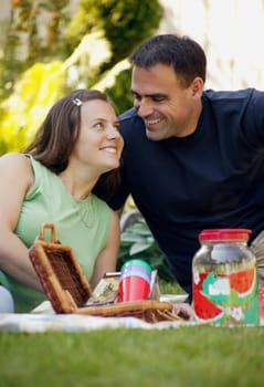 Adult couple at a picnic