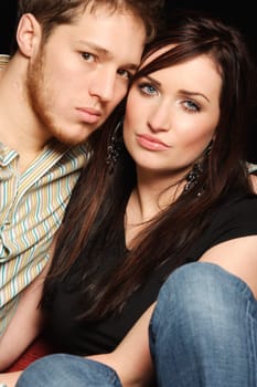 Couple sitting close together