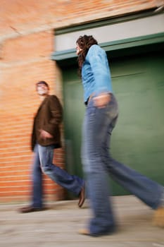 Couple walking on pavement
