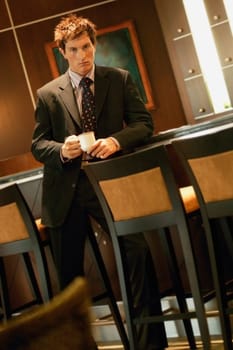 Businessman with cup of coffee