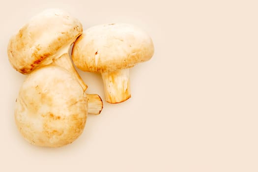Three button mushrooms
