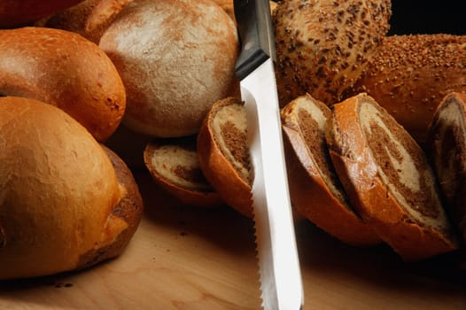 A selection of breads and a bread knife