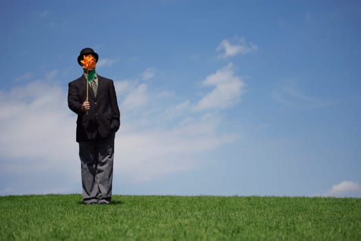 Businessman with a windmill