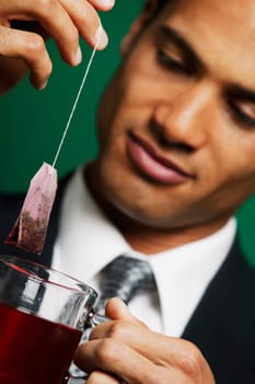 Businessman having tea