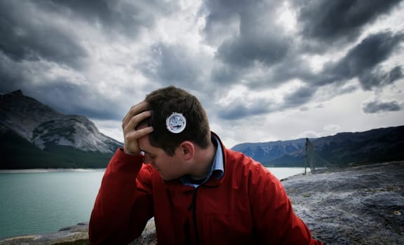 Man with compass graphic on head