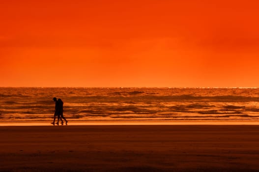 Sunset Walk Along the Beach