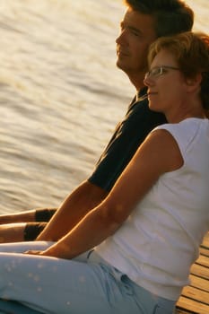 Couple looking out over water