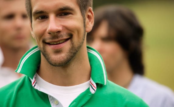 A portrait of smiling young man with beard