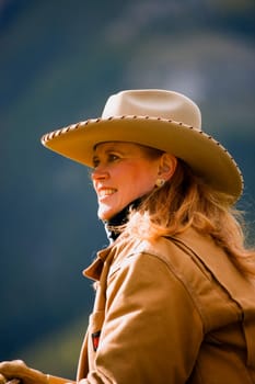 A portrait of a female rancher