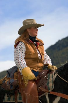 A portrait of a woman on horseback