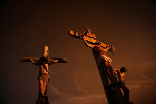 Jesus on cross with two others