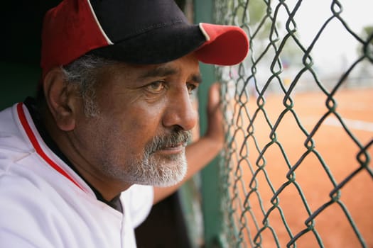 Baseball player in dugout