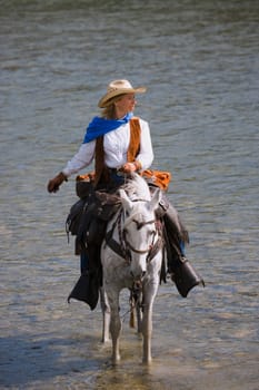 Woman riding horse